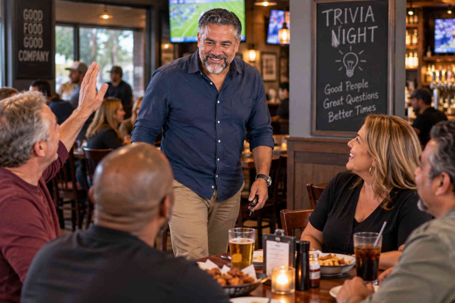 Divorced man being warmly welcomed by friends at a neighborhood restaurant